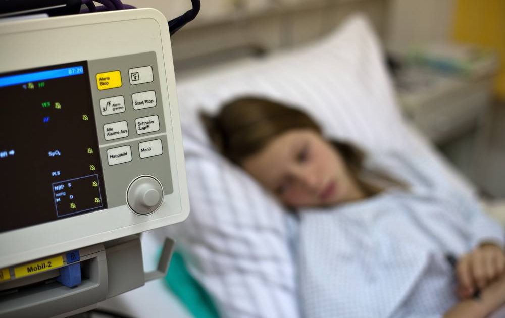 image-woman-in-hospital-bed