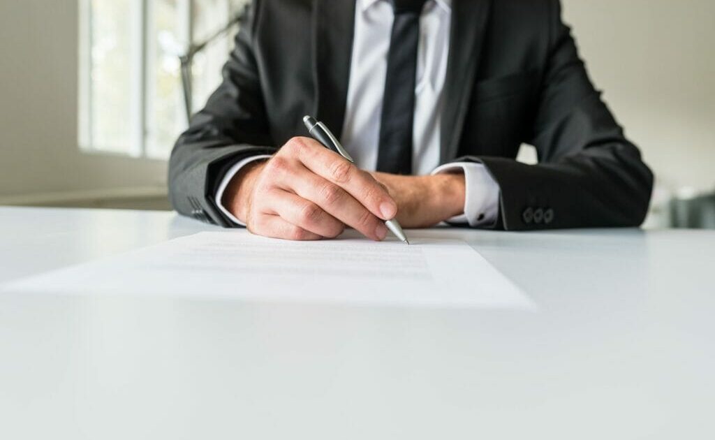 image-business-employer-signing-paperwork-1024x684