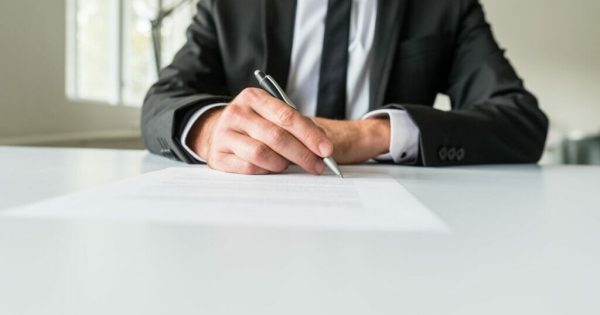 image-business-employer-signing-paperwork-1024x684