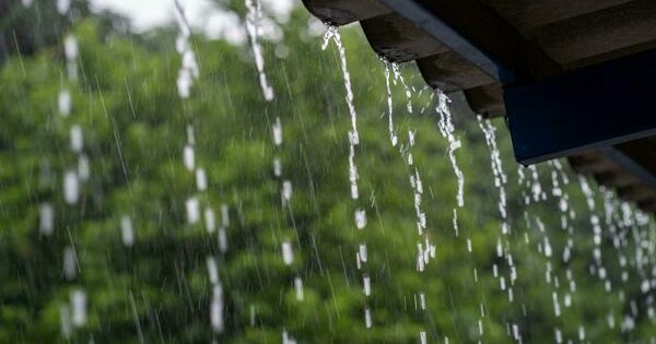 image-heavy-rain-falling-on-the-roof-in-rainy-season-photo