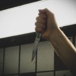 image-dangerous-man-murderer-with-a-knife-on-his-hand
