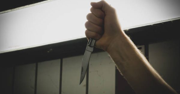 image-dangerous-man-murderer-with-a-knife-on-his-hand