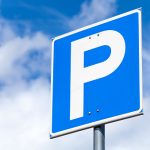 image-blue-square-parking-road-sign-over-cloudy-sky-background