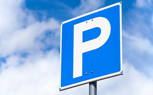image-blue-square-parking-road-sign-over-cloudy-sky-background