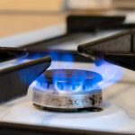 image-old-kitchen-stove-cook-with-blue-flames-burning-can-be-a-source-of-fire-or-explosion