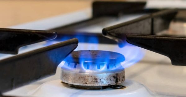 image-old-kitchen-stove-cook-with-blue-flames-burning-can-be-a-source-of-fire-or-explosion